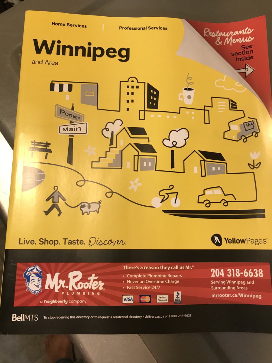 iamshangreaux's tweet photo. Who remembers using these things??? The irony is that beside Portage & Main there’s a human walking a dog on the street. However, it’s lying bc you can’t walk across the street at Winnipeg’s most famous intersection! #VoteOpen https://t.co/lZymhVMIxR