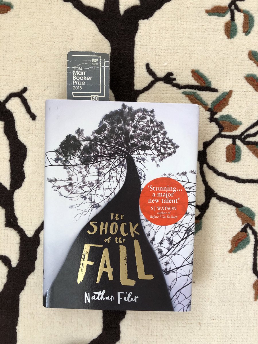 Booker_Man's tweet photo. Enjoying #TheShockOfTheFall by @nathanfiler in @HarperCollinsUK in the beautiful sunshine. A very intimate feeling and evocative story. Reminds me so much of @clarewigfall’s writing, especially #WhenTheWaspsDrowned which I used to use to teach GCSE English. https://t.co/yhQx9ej9AG