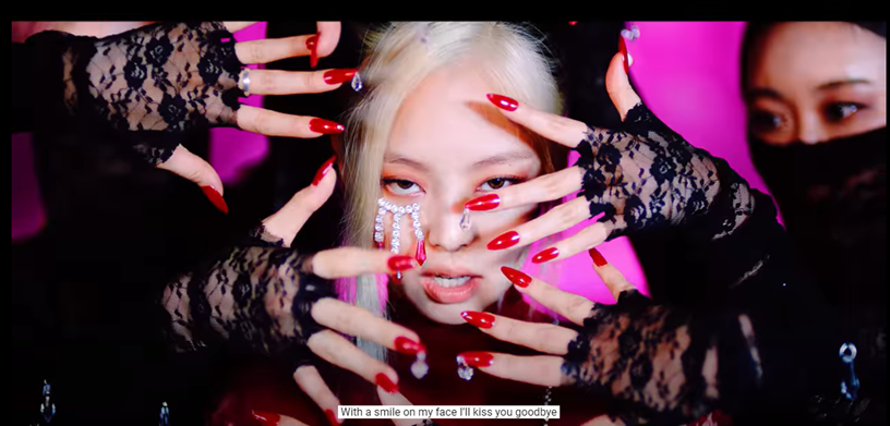 15.The red nails represent the criticism thrown on their face. And Jennie’s face shows two sides, one with tears (their inner feelings) and the other with anger/confidence (how they showed the public)