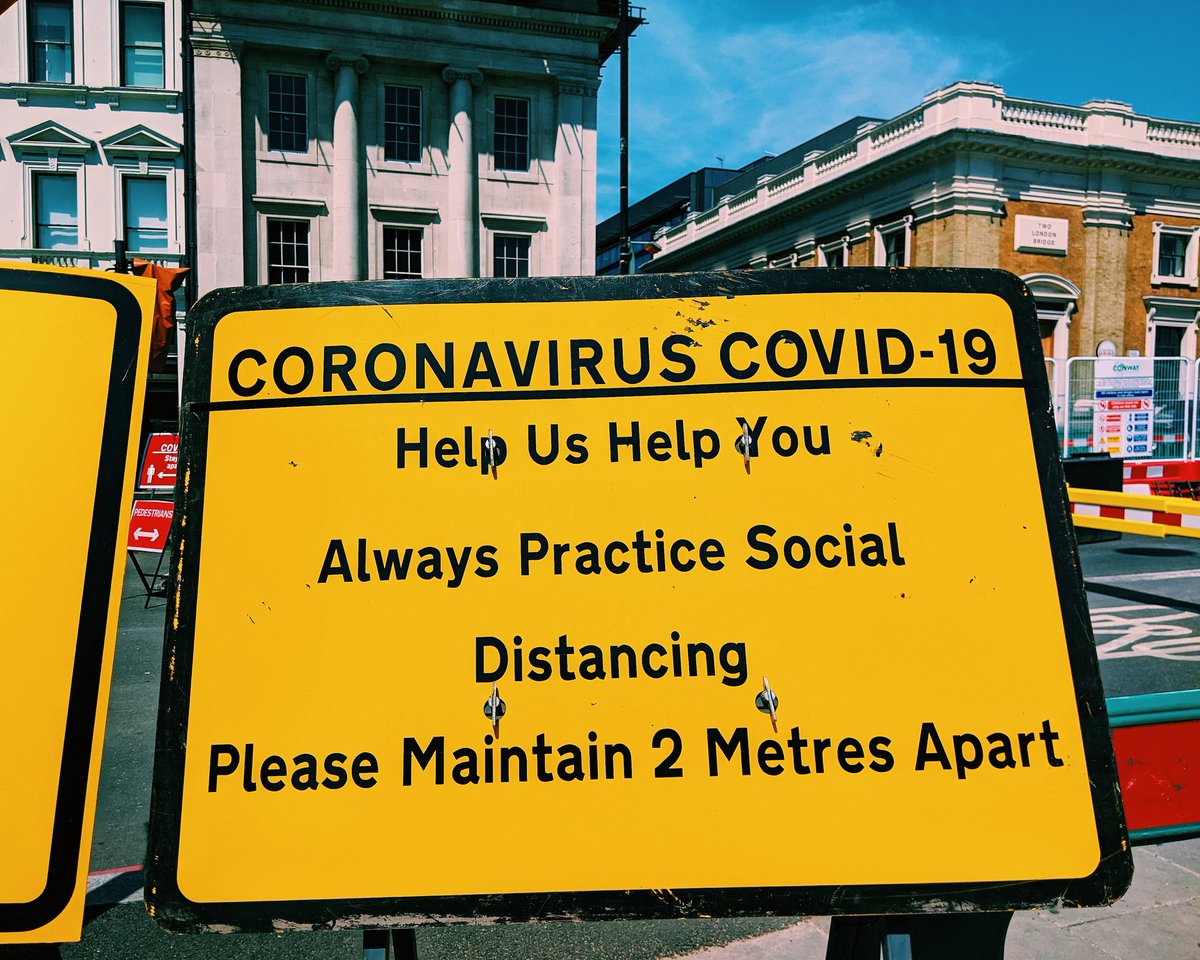 London Bridge  Something which surprised me was the sheer number of signs about Coronavirus, everywhere. In the streets, in shop windows, on the side of buses. Really, everywhere. There's a lot of pedestrian walkway diversion, too. / Trip into central London; No. 9