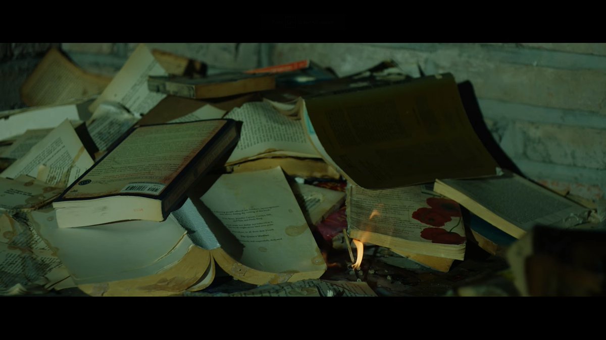 Tae is in Yoongi's Fake Love room, looks very similar, up to the lighting. But Tae has tons of books in this room and he is setting them aflame... which is why we have tiny bits of paper falling down.Burning books to keep warm or because they did not help him out? @BTS_twt