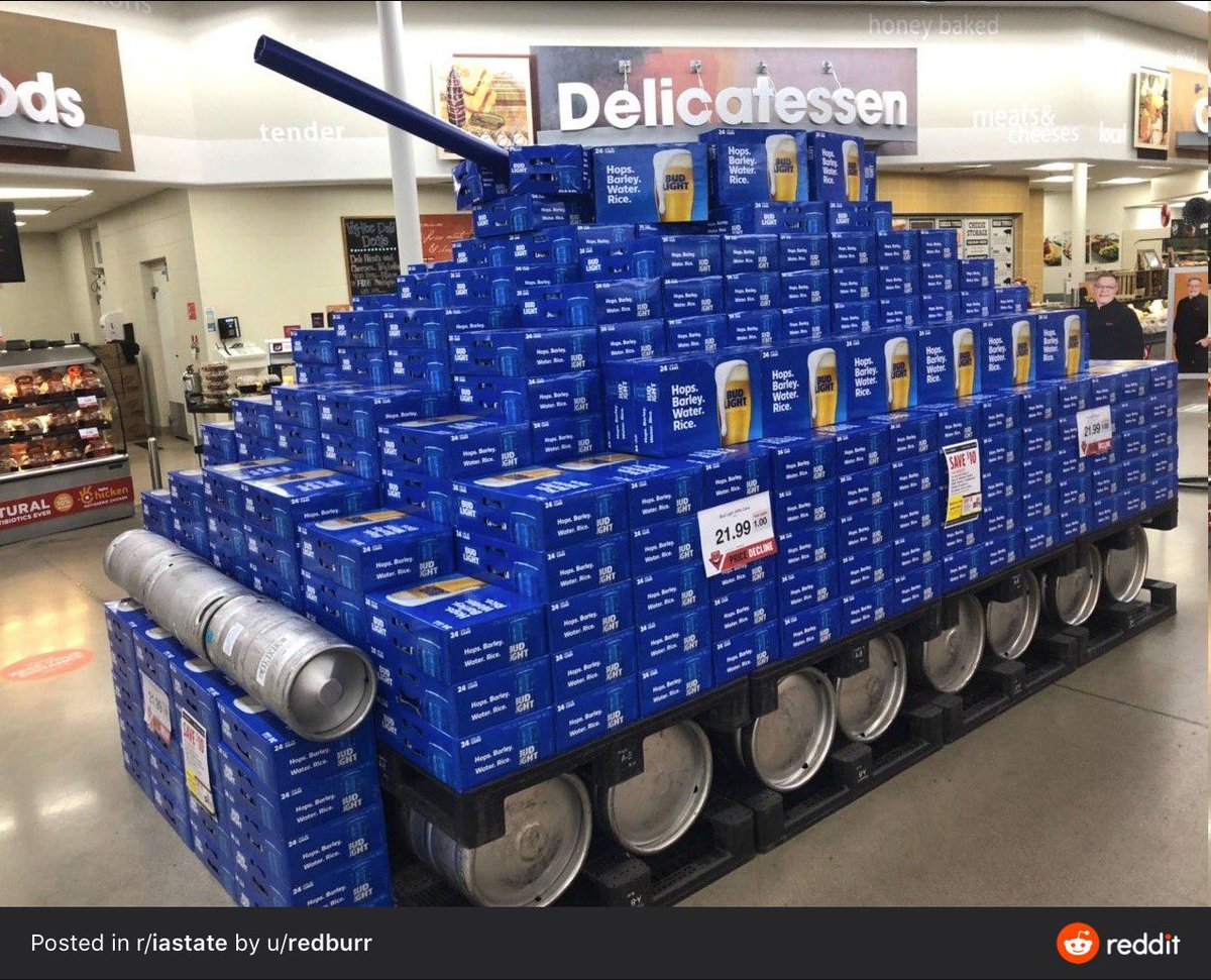 BarstoolISU's tweet photo. In case you were wondering, Ames HyVee is saying busy while students are gone by building a statue of David Montgomery https://t.co/TQ9wqSO2Ax