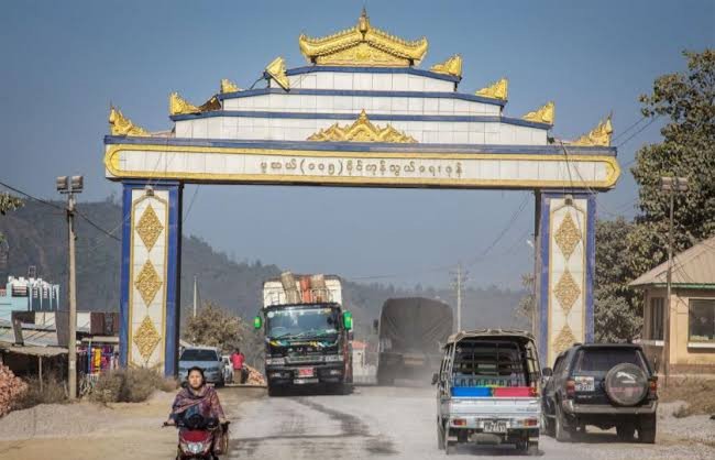 This is the Chinese Mayanmar borderJiegao on Chinese sideMuse on the Mayanmar side Every day several caravans of Chinese trucks carry Chinese consumer goods into Mayanmar through this border