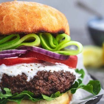 This Greek Beef Burger with Tzatziki Sauce from <a href="/CremedelaCrumb1/">TiffanyAzure</a> sounds like the ultimate summer burger! buff.ly/3esZKEg