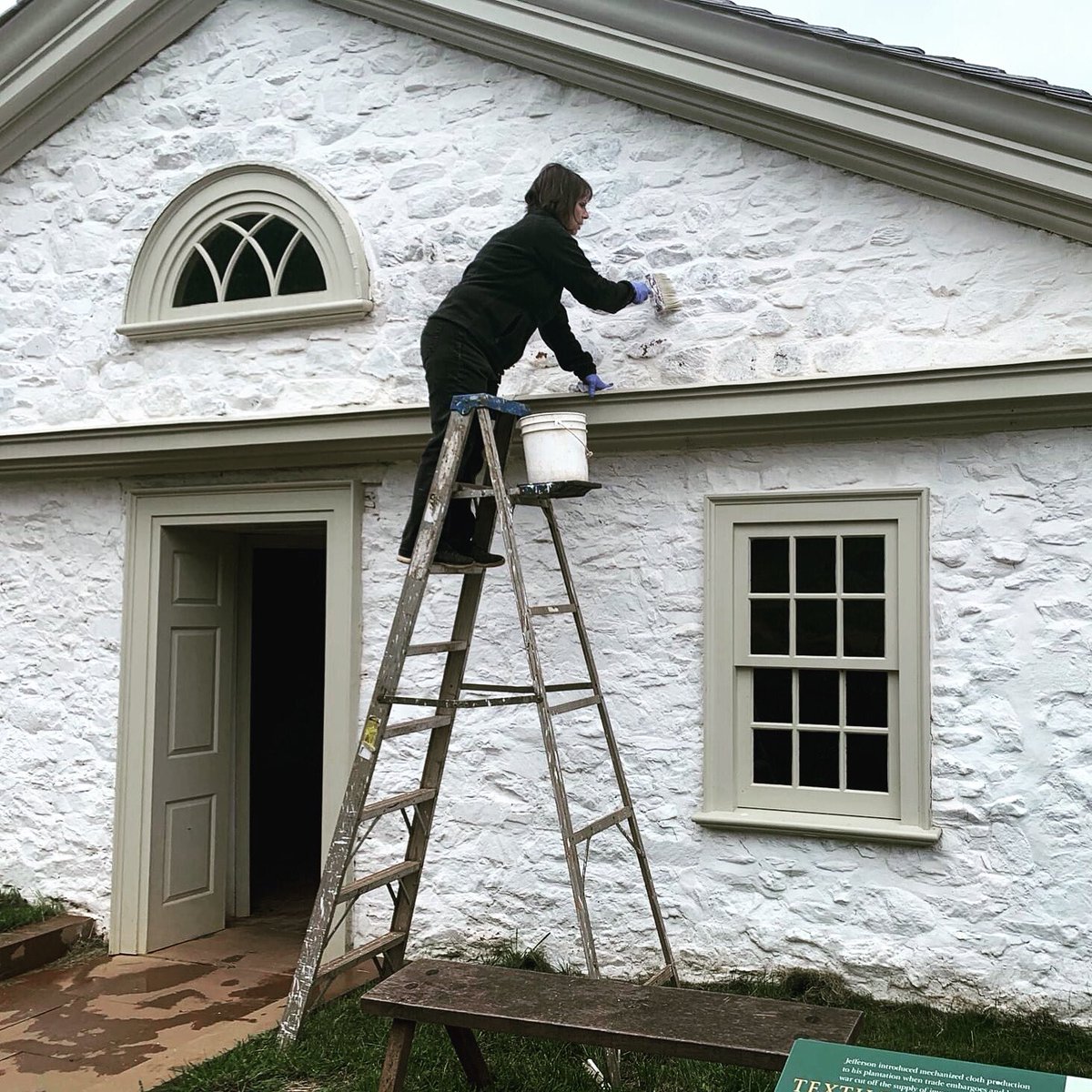 Limewash was the original finish used on many buildings on Monticello's mountaintop. It's anti-fungal, sustainable, and breathable...it's even fire retardant! But it does require some upkeep. Here, Carol refreshes the limewash on the Textile Workshop.