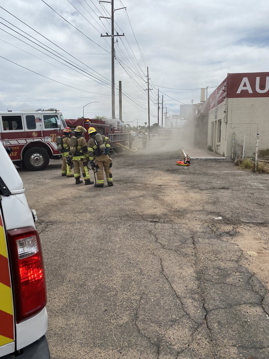 TucsonFireDept's tweet photo. A fire in a row of vacant store fronts has been extinguished. #SWGas and #TEP are on scene. Eastbound traffic is down to one lane in the 4100 block of E. Grant #TucsonFire #TFD https://t.co/CL6chfIQlW