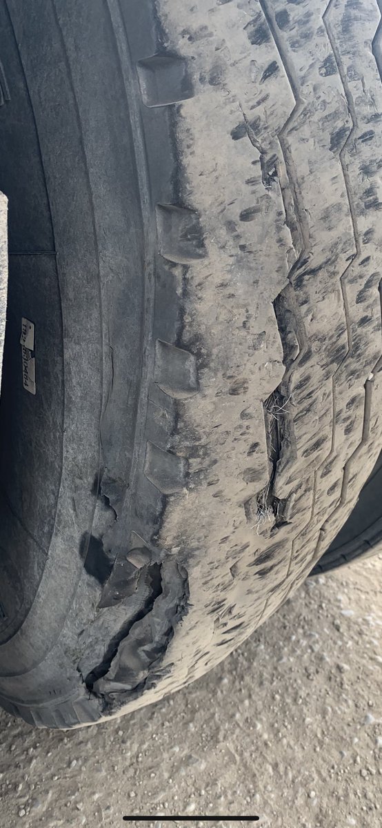 TeoOntario's tweet photo. MTO Officer stopped this loaded transport travelling 129kph in a 90kph zone. Looking closer the Officer found a trailer tire coming apart. Potential for disaster, charges laid. #RoadSafety #MTOOfficer @fordnation @ONtransport https://t.co/kLIjIdOsVc