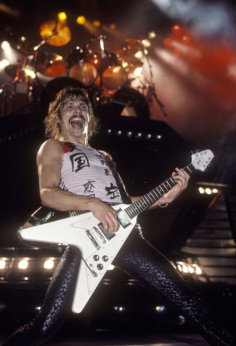 Rudolf Schenker - rhythm guitar & backing vocals, occasional lead guitar & rare lead vocals ('65 - present)- founded the original incarnation at 16 in 1965- primary music composer- only tends to play flying V's- has massive flying V collection- loves yoga & cats- is WILD