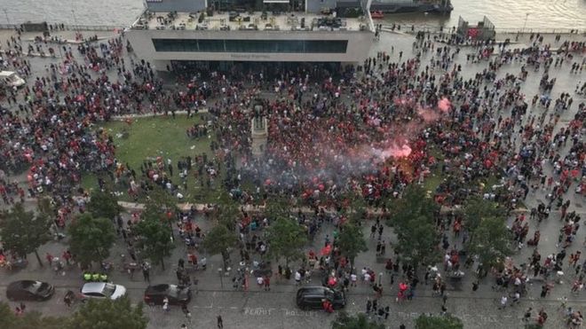 BBCSport's tweet photo. Crowds are gathering in Liverpool for the second night in a row to celebrate the Premier League win.

Mayor Joe Anderson has urged people gathering to return home.

In full ➡ https://t.co/kFY37ptDL2 https://t.co/ZTCA5dPdro