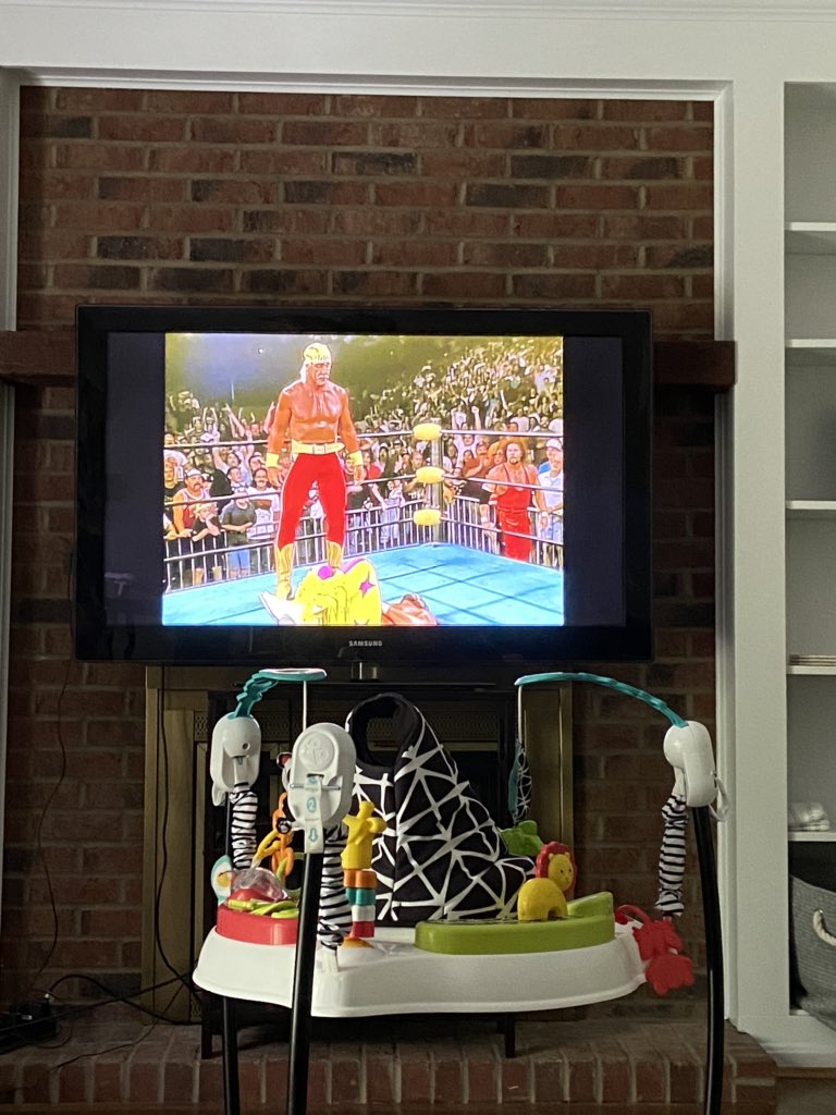 HHaynes5's tweet photo. Day 1828379542 sans daycare - today, daddy taught our 10-month old about Hulk Hogan and Bash at the Beach ‘96 🤦🏻‍♀️ https://t.co/p6NQ0wShVr