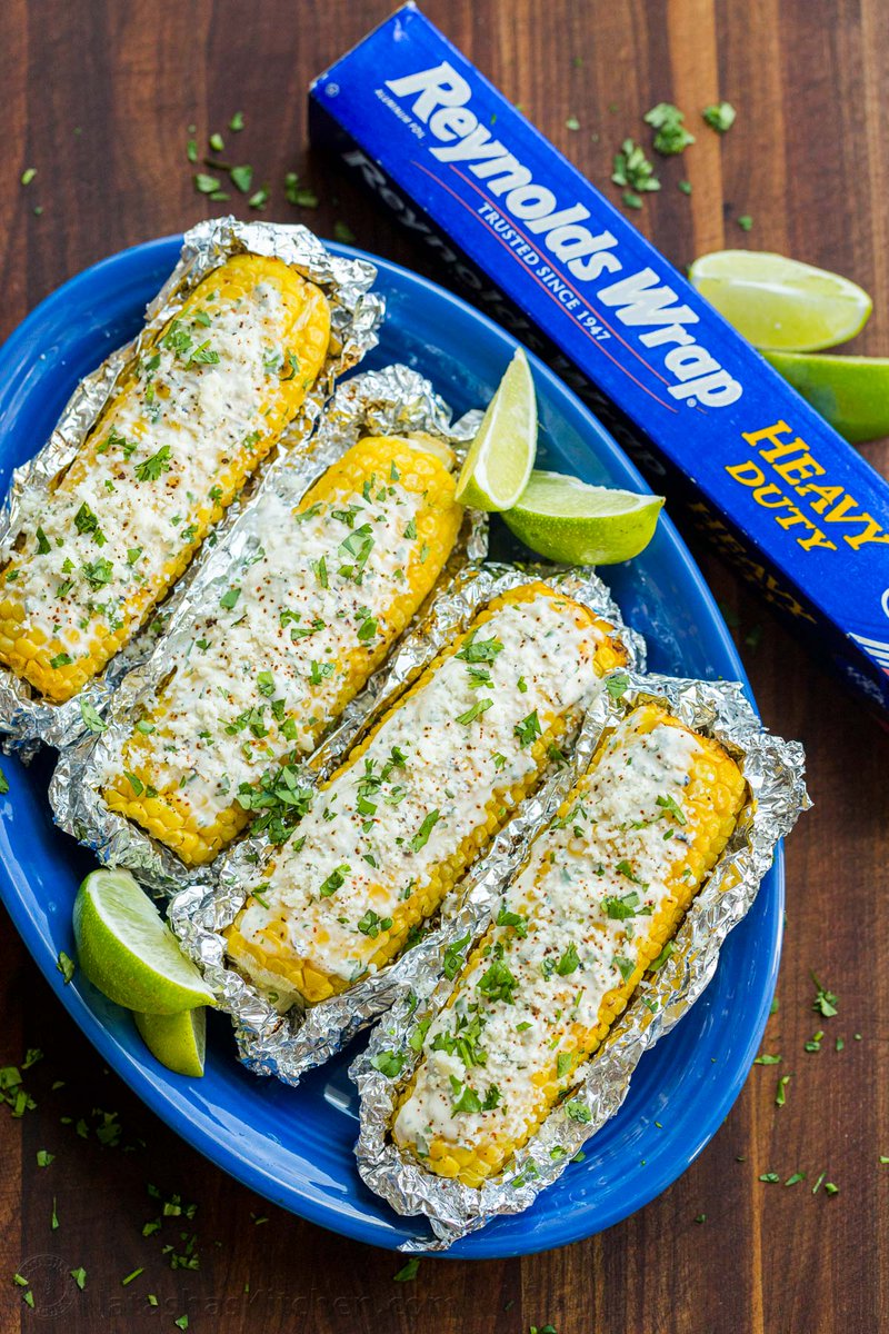 Have you tried Mexican Street Corn? One bite and you’ll realize why it’s so popular! It's so convenient to make and serve with Reynolds Wrap heavy-duty foil and cleanup is a breeze. @ReynoldsBrands #ReynoldsPartner #sponsored Recipe: natashaskitchen.com/mexican-street…