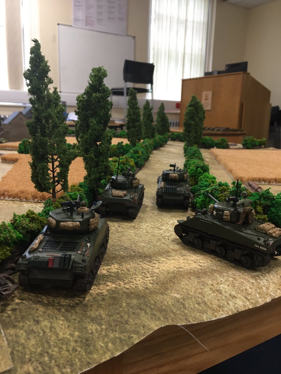 Whilst some armour has broken out into the Bocage, the majority of the attacked tank platoon remains concentrated and canalised along a single lane bordered by dense bocage either side... perfect ambush territory for any prowling German Panzers!