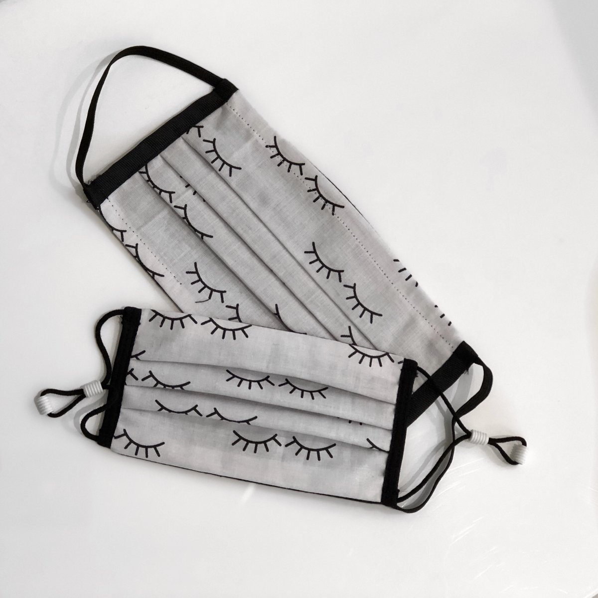 AlexRivero_RN's tweet photo. Yay So glad you all are loving the masks as much as I do! ★★★★★ "My new favorite mask!" Olivia H. https://t.co/Z13phxFn8N #etsy #black #white #fastmask #mask #filter #lashes #eyelashes #cute #adorable https://t.co/S1Kvlzcu25