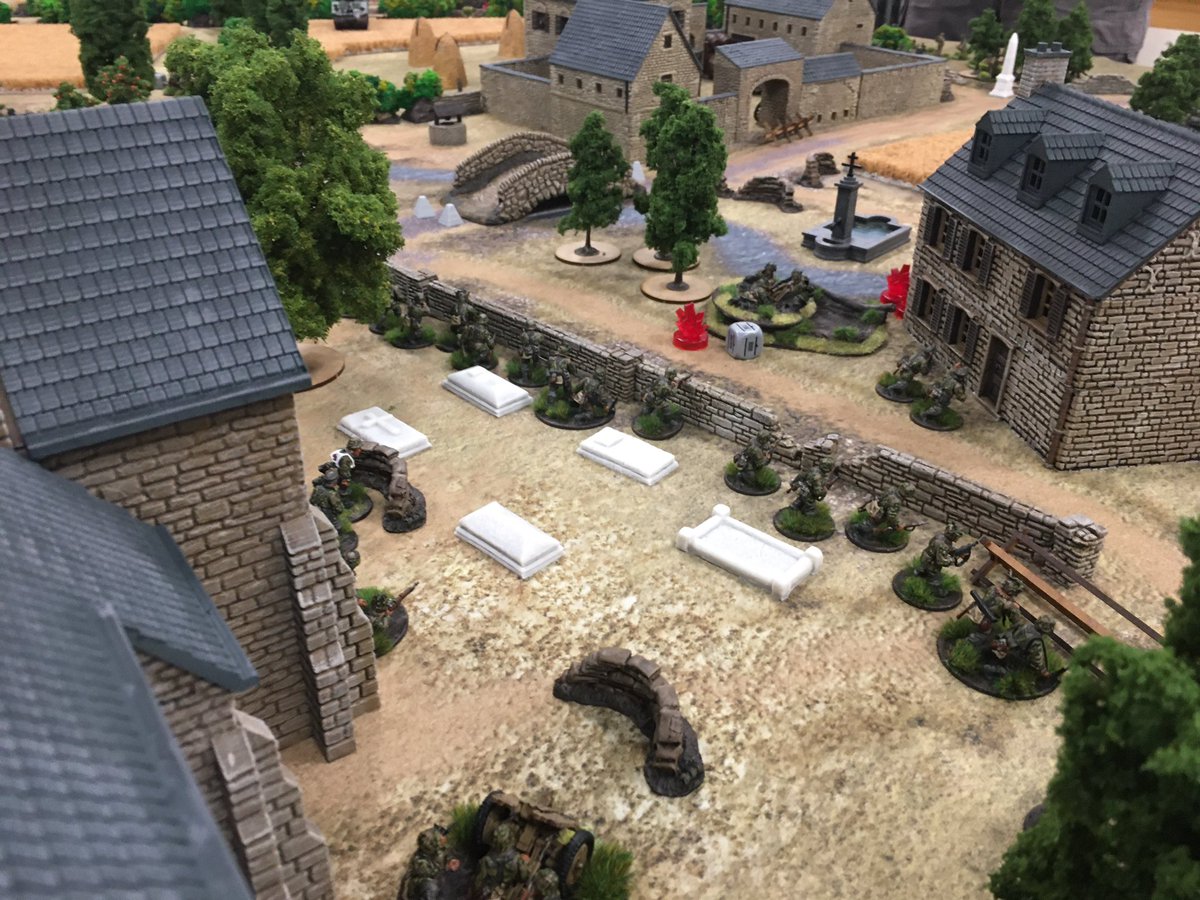 Behind the watermill, a full PzGrenadier Zug moves forward, establishing a strong secondary defensive line capable of unleashing ferocious firepower from its six MG42 teams. This Zug will also form the core of the counter-attack against the lost first farmstead.