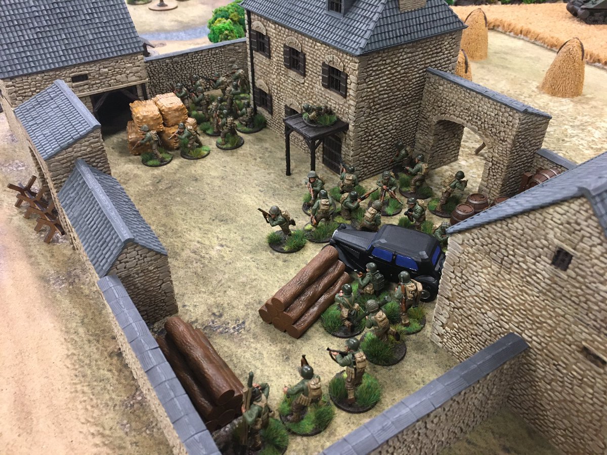 Despite growing losses, US infantry !now protected by its stone walls consolidate their position in the first farmstead, fortifying it in advance of the expected heavy German counter-attack.