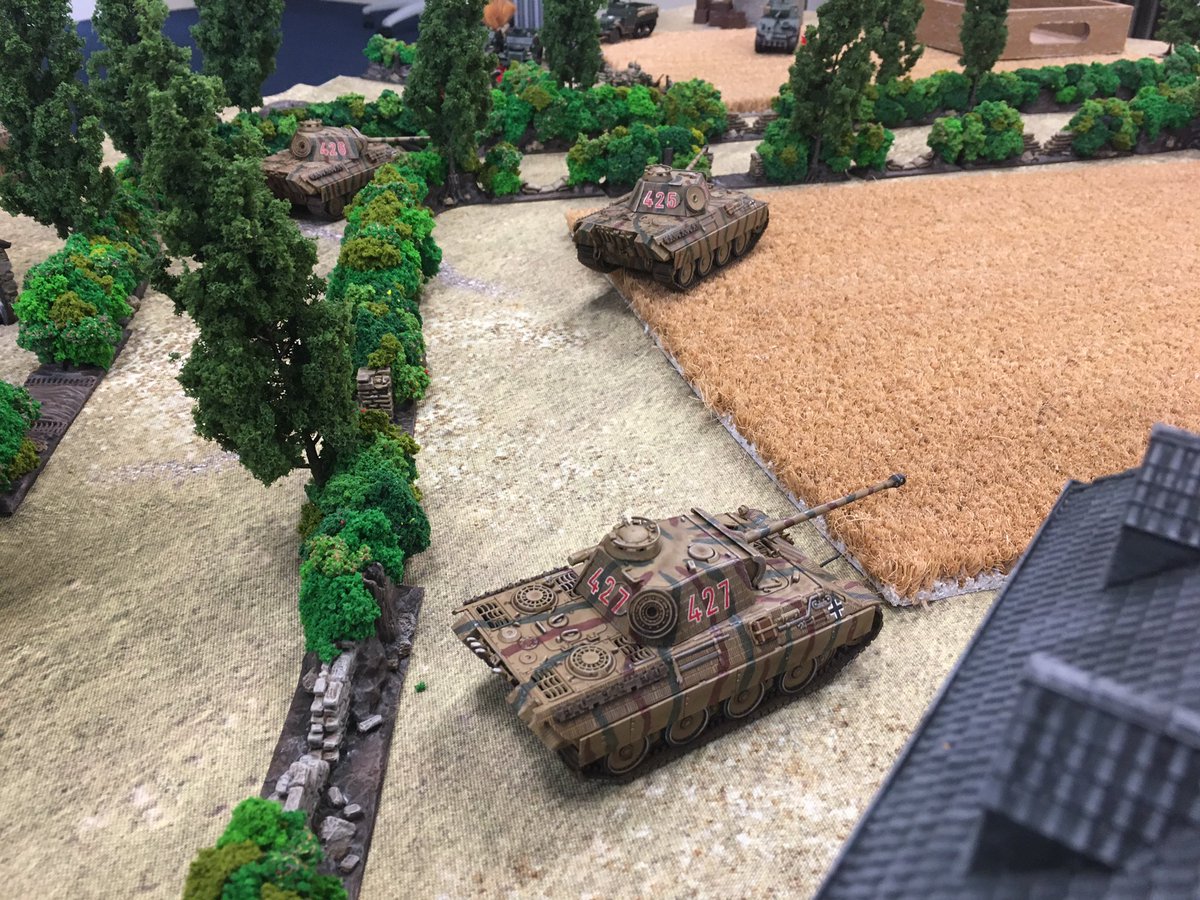 However, taking advantage of the canalised US armour, the German Panthers break out, rumbling through the wheat fields, their long 75mm guns wreaking havoc on the extreme left targeting any remaining US armour and exposed Infantry sections.