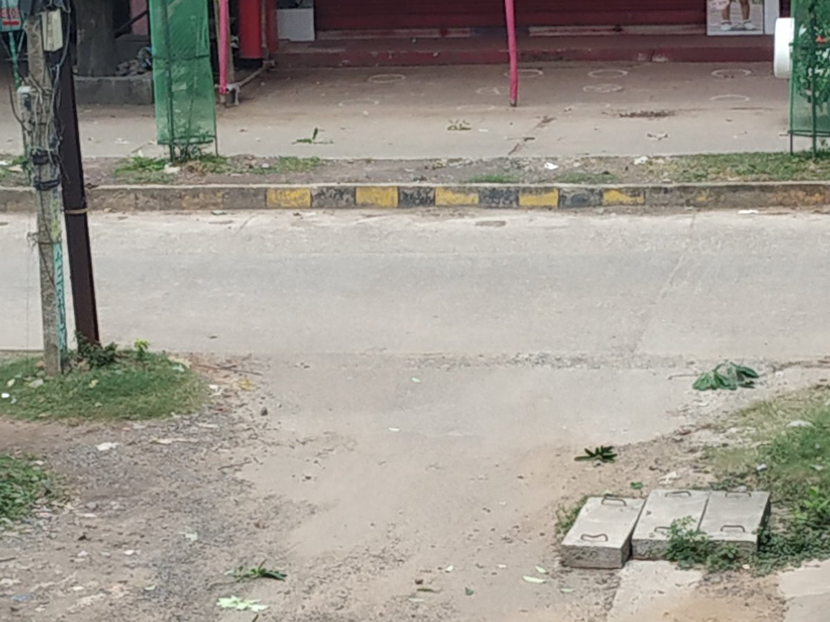 SambitK06088578's tweet photo. @CMCCuttack @AnanyaDasIAS Madam due to this slab many accidents are occurring daily. This slab is kept there since many months. 
It is in sector 9 CDA in front of Anshika fashions near Saraswati Sishu Mandir. https://t.co/tvfhMOWr5h
