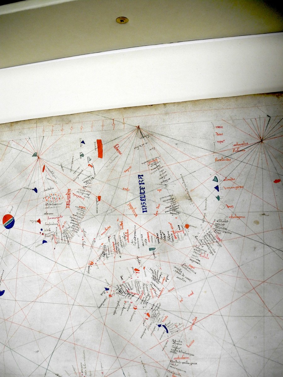 The first was a portolan chart from 1424. Portolans were used to navigate from port to port, rather than to give a realistic picture generally. This shows the Atlantic, and possibly Greenland & Cape Verde. It was the first map to show "Antilla" as a landmass across the ocean.