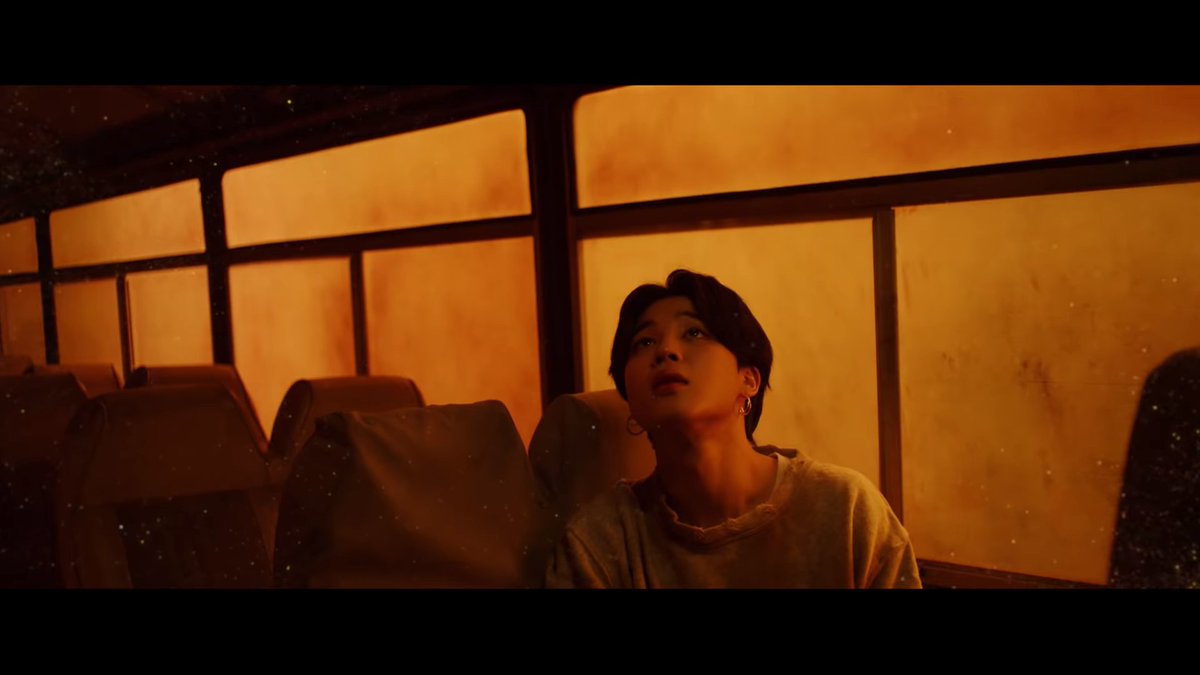 Back to the grey world. Have you noticed that the gold specks come from above? They all lift up their heads. The only way is to go up, to rise. And this is what Jin does going up the stairs.Remember ON mv, going up the mountain? @BTS_twt