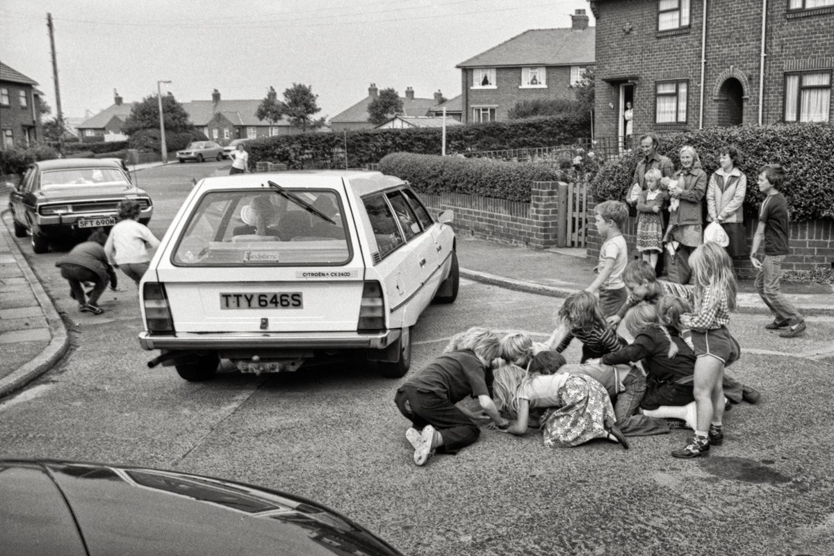 mikcritchlow's tweet photo. Saturday morning Church Hall jumble sales - Kid's scrambling for pennies thrown from the cars as a bride leaves the family home for her wedding - Bridesmaids chasing a balloon at the Social Club reception. Always a great start to the weekend -1980s. https://t.co/w4MXQNtdQ2