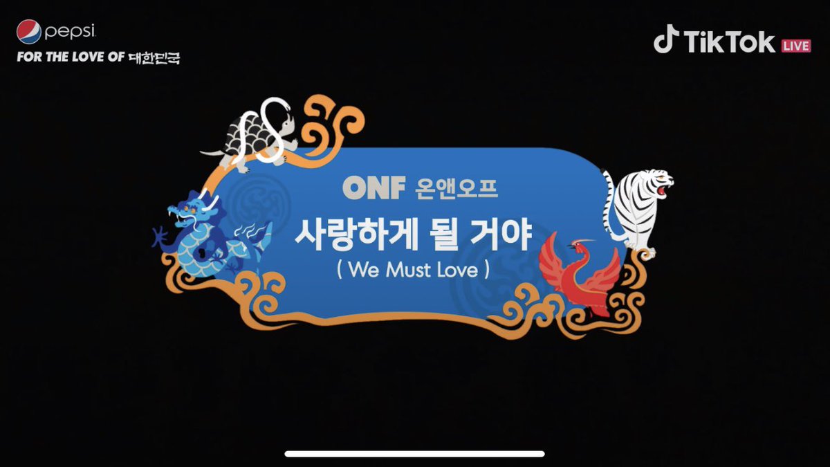 ONF are currently performing their song "We Must Love"