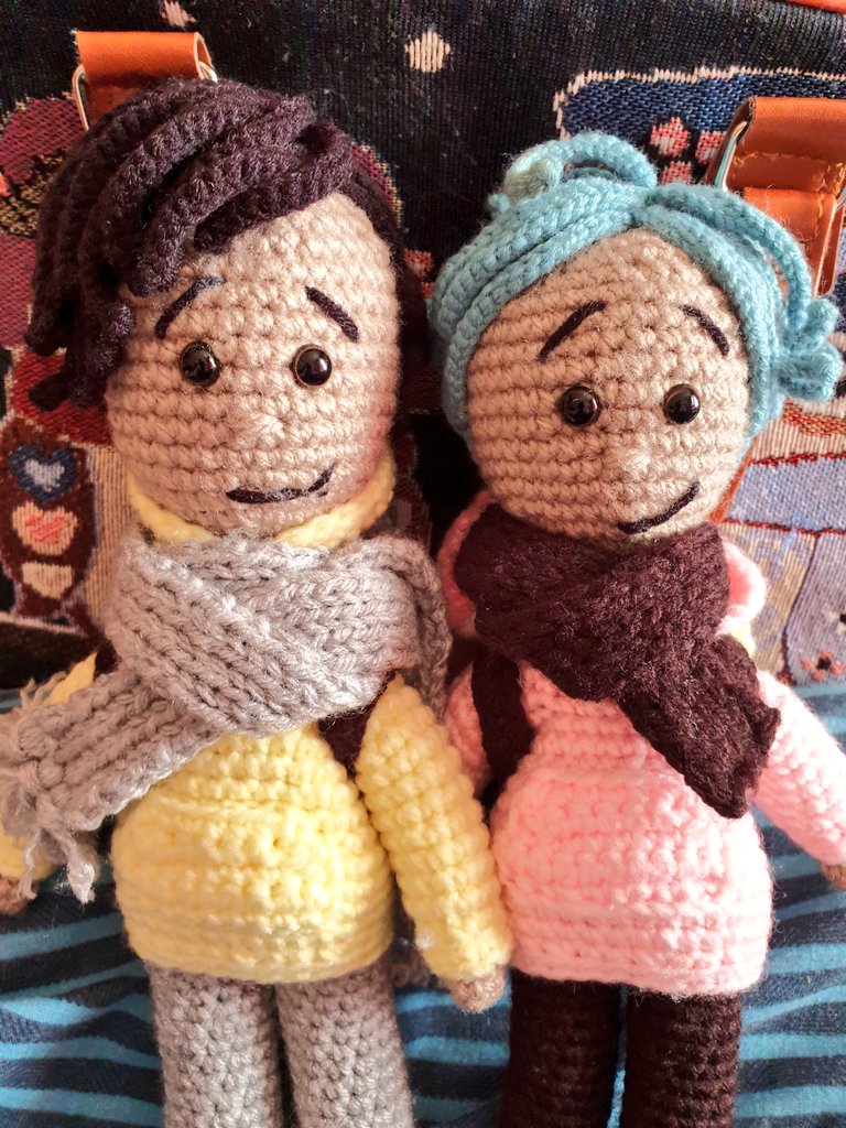 Other than having no shoes, I now consider my Xiao Zhan and Wang Yibo  #amigurumi dolls officially done!  #crochet  #bjyx Featuring: that pink hoodie the matching yellow hoodie backpack backpack Yibo's blue hair Xiao Zhan's side parting winter scarves