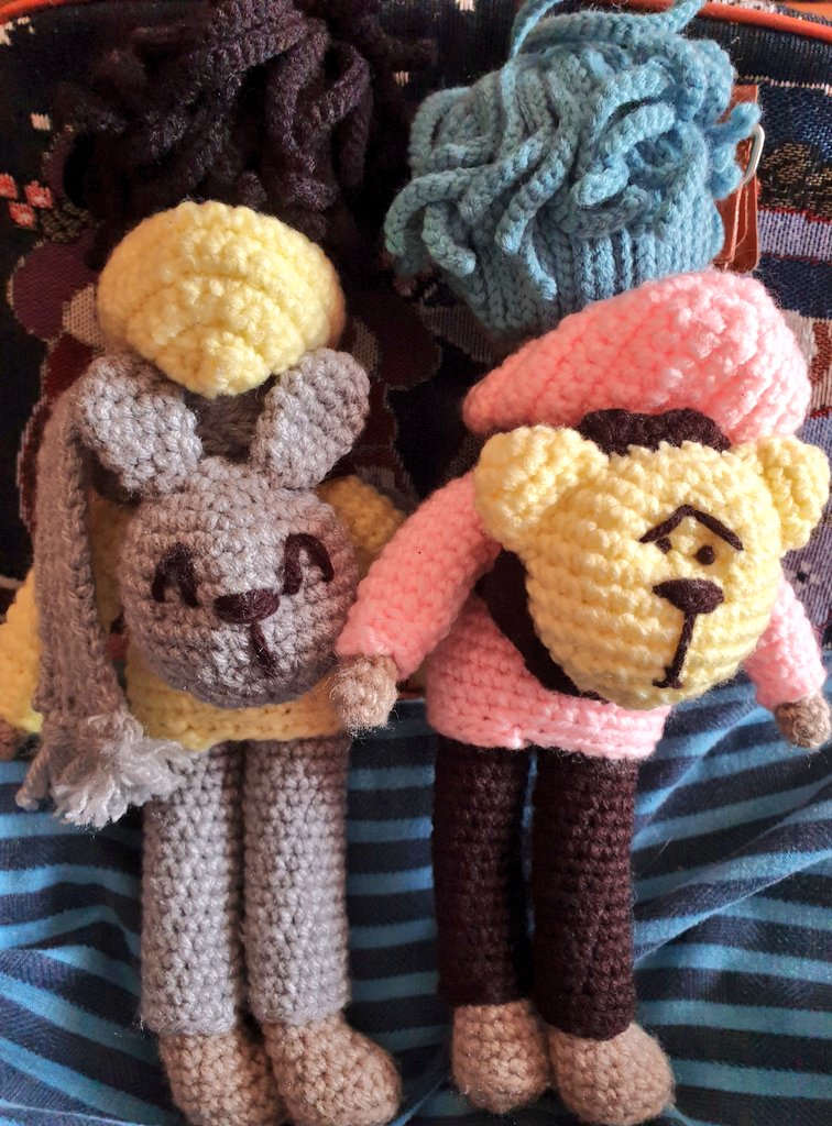 Other than having no shoes, I now consider my Xiao Zhan and Wang Yibo  #amigurumi dolls officially done!  #crochet  #bjyx Featuring: that pink hoodie the matching yellow hoodie backpack backpack Yibo's blue hair Xiao Zhan's side parting winter scarves