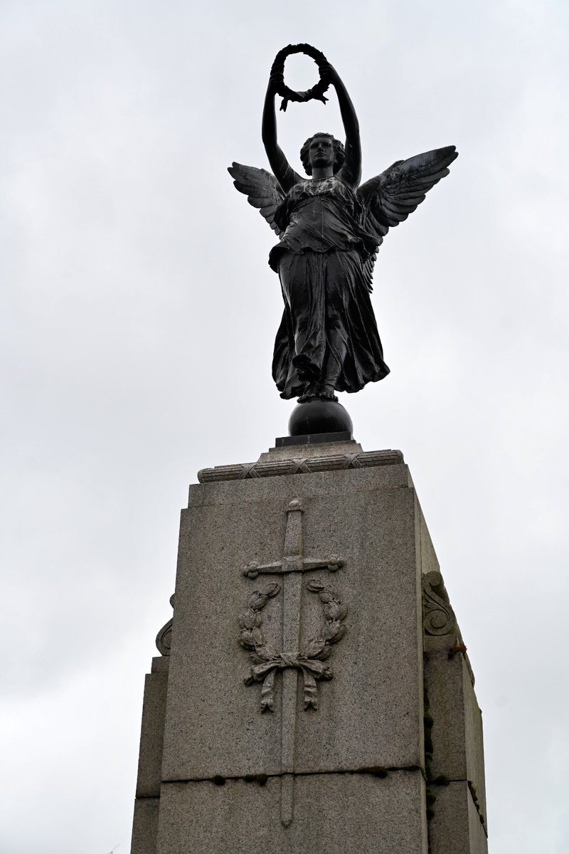 Partick and Whiteinch War Memorial in Victoria Park is surmounted by a winged figure of Victory - a bronze female figure with outspread wings standing on a globe and holding out a wreath with both hands.  #WomenMakeHistory  @womenslibrary
