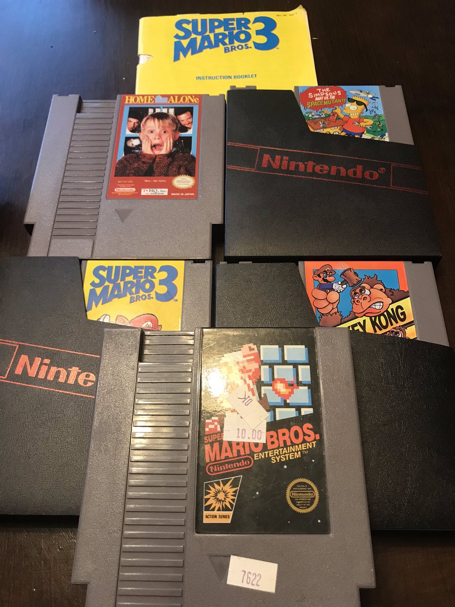 Along with these boxed games were some other NES classics. Super Mario Bros 1 and 3, DK, Home Alone, and a Simpsons game. All in great condition. There was also the beat up manual for SMB3.