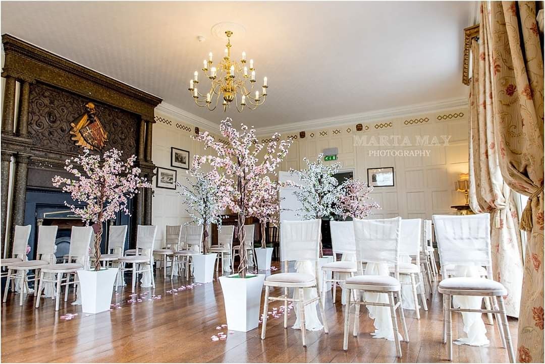 Our gorgeous blossom trees at <a href="/hommehouse/">Homme House</a> with our rose petals, captured by @martamayphotos! Guest chairs styled by <a href="/BstyledDecor/">Bstyled</a>. For ideas, guidance &amp; pricing for us to transform your aisle, please get in touch by emailing hello@aislehireit.co.uk! Always happy to chat 😊