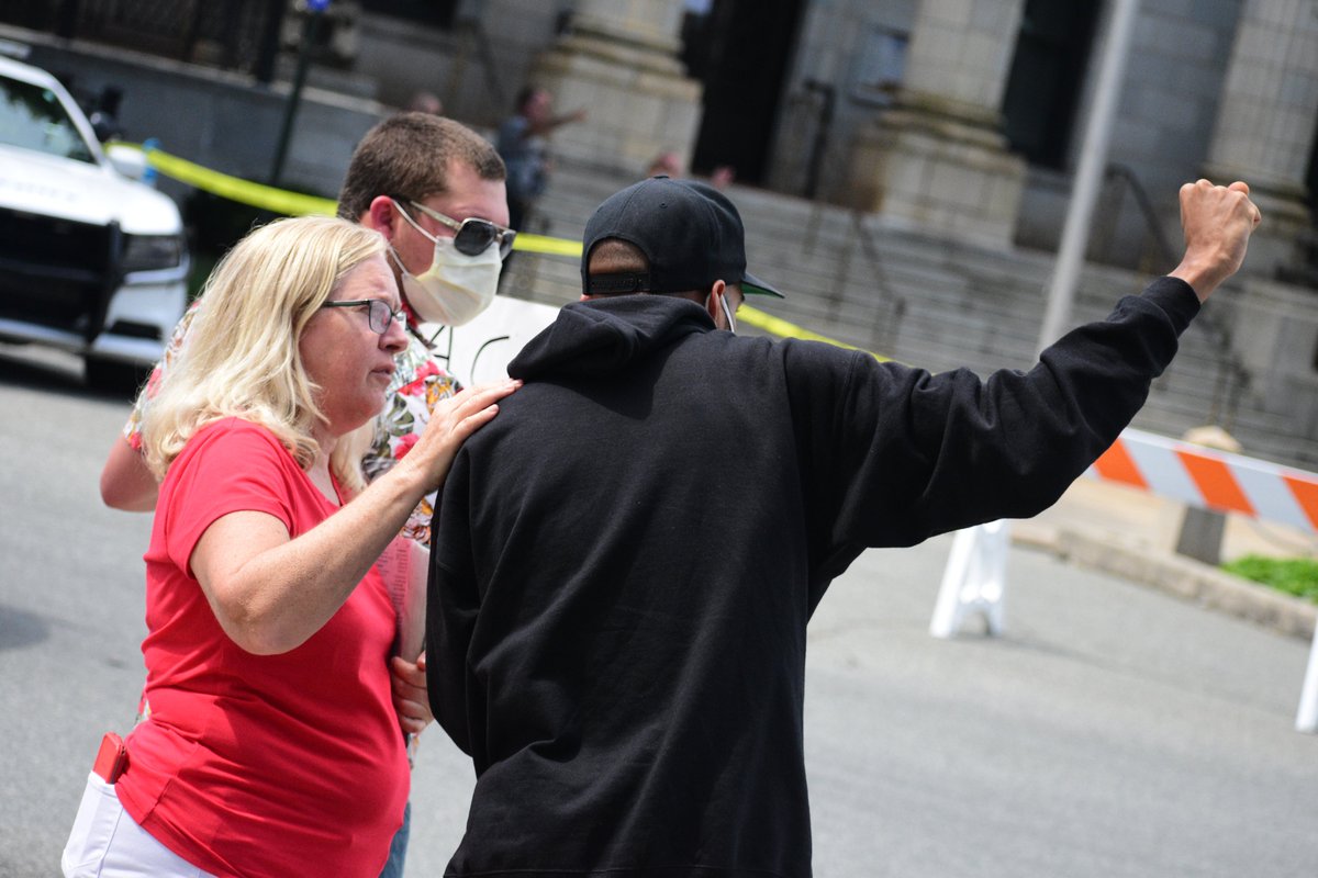 Two other women showed up with Bibles to pray for peace. At this point, everything was quite relaxed with protesters occasionally chatting with law enforcement.