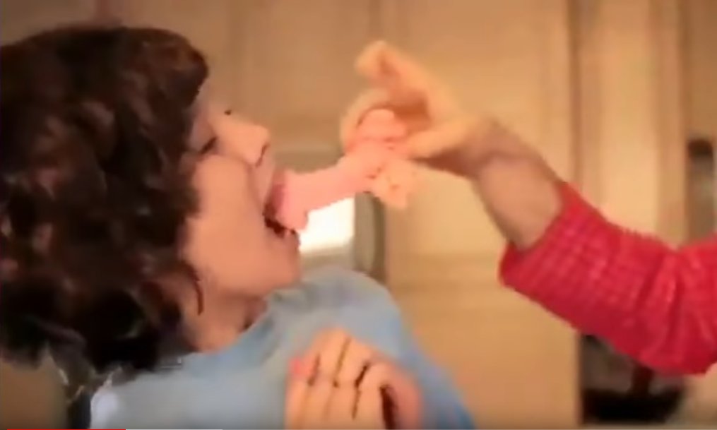 YouTube darling Shane Dawson feeds penis shaped cookies to young boy.