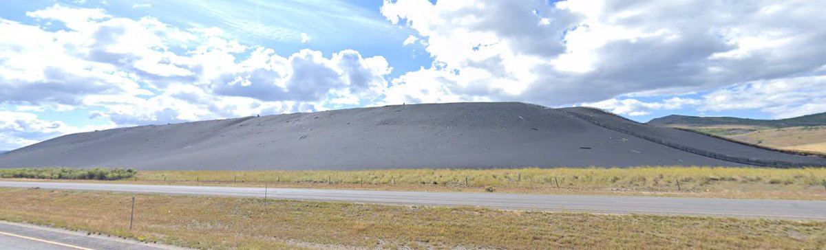 Slag pile @ the old smelter in Anaconda. I believe there's a company making abrasives out of this now -- which follows a trend of modern day reuse of 19th/early-mid 20th c mine tailings given how much material was frequently left in them