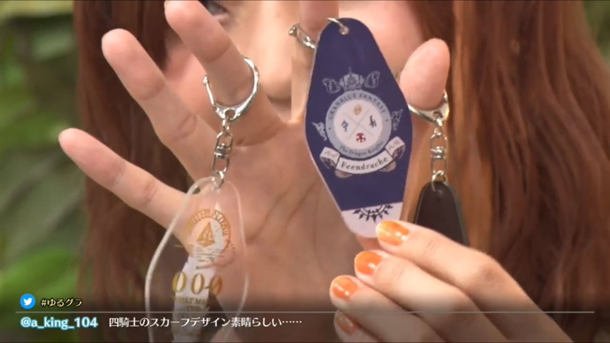 Crystal-shaped keychains, representing 000, the Dragon Knights, and Spaghetti Syndrome