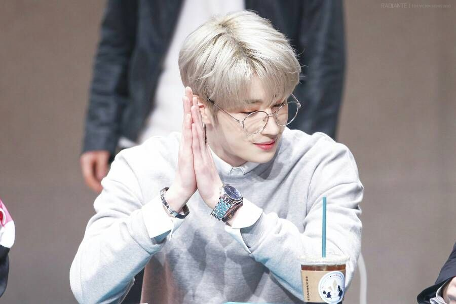 3. seungwoo handsome with blond hair and glasses
