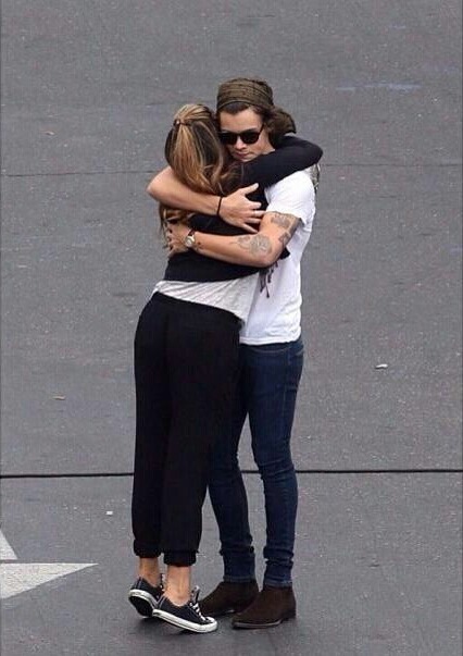 "Louis on his toes kissing Harry"Yeah okay