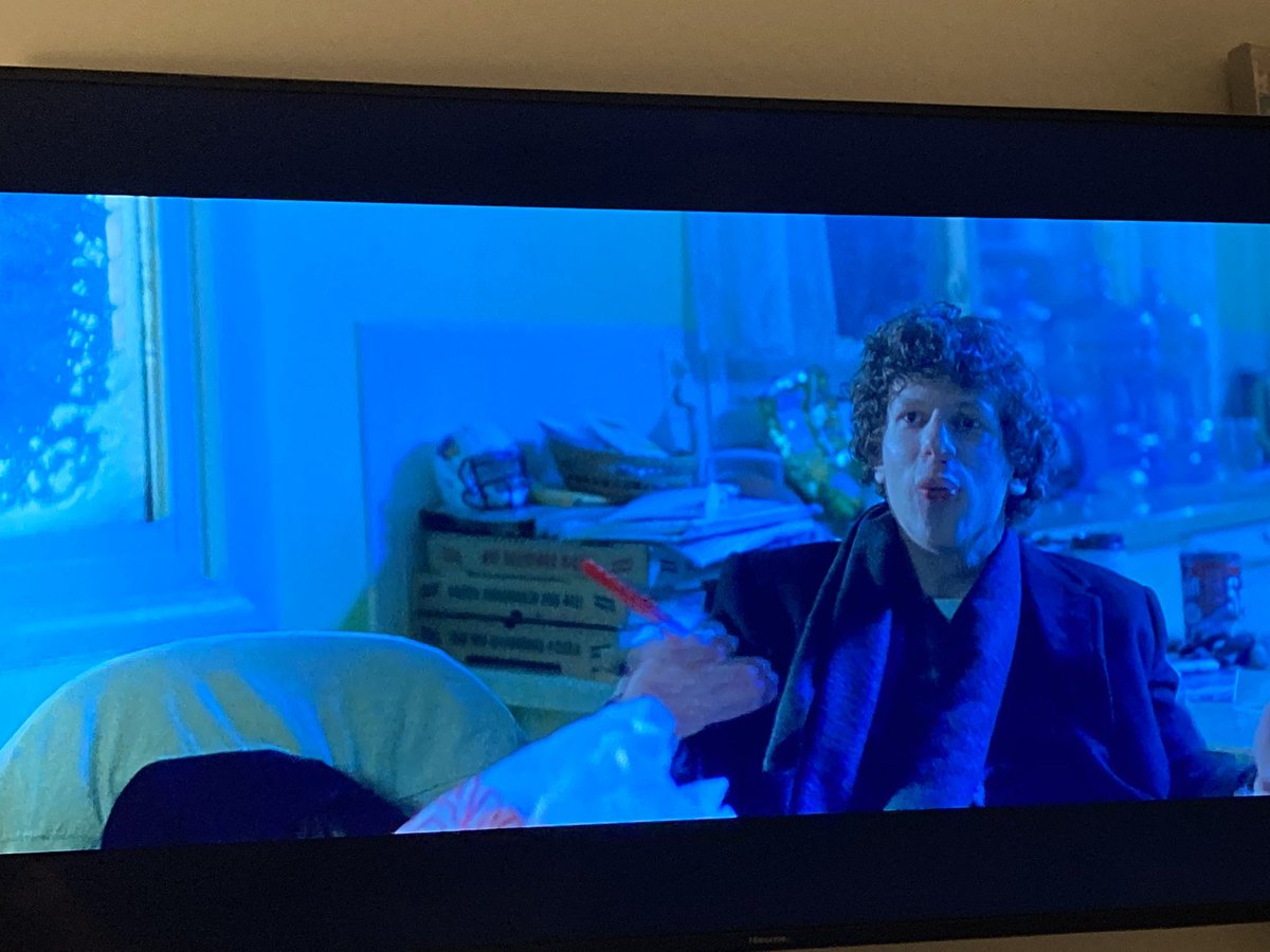J11Ruble's tweet photo. #EndoftheTour about David Foster Wallece with a #Birds 🏈 helmet behind Jesse Eisenberg https://t.co/KOwNTE4eCB