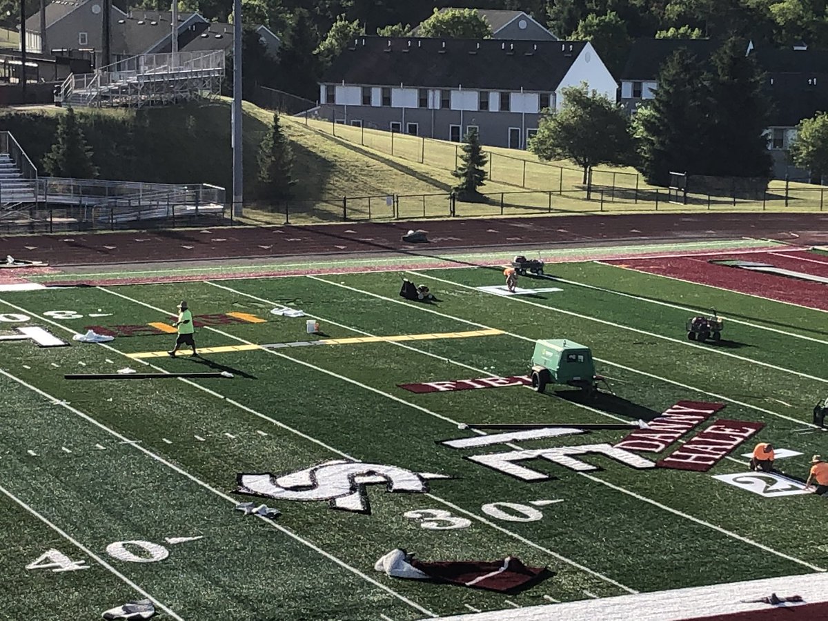CoachHenicles's tweet photo. A few days behind on updates but the Redman Stadium resurfacing is being finished with logos &amp; lettering going in.  Be back shortly with the finished product. https://t.co/RW1DHSdap5