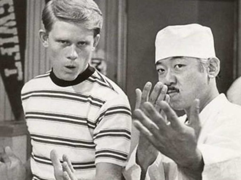 Remembering Pat Morita on his birthday!  Here he is with Ron Howard in \"Happy Days\". 