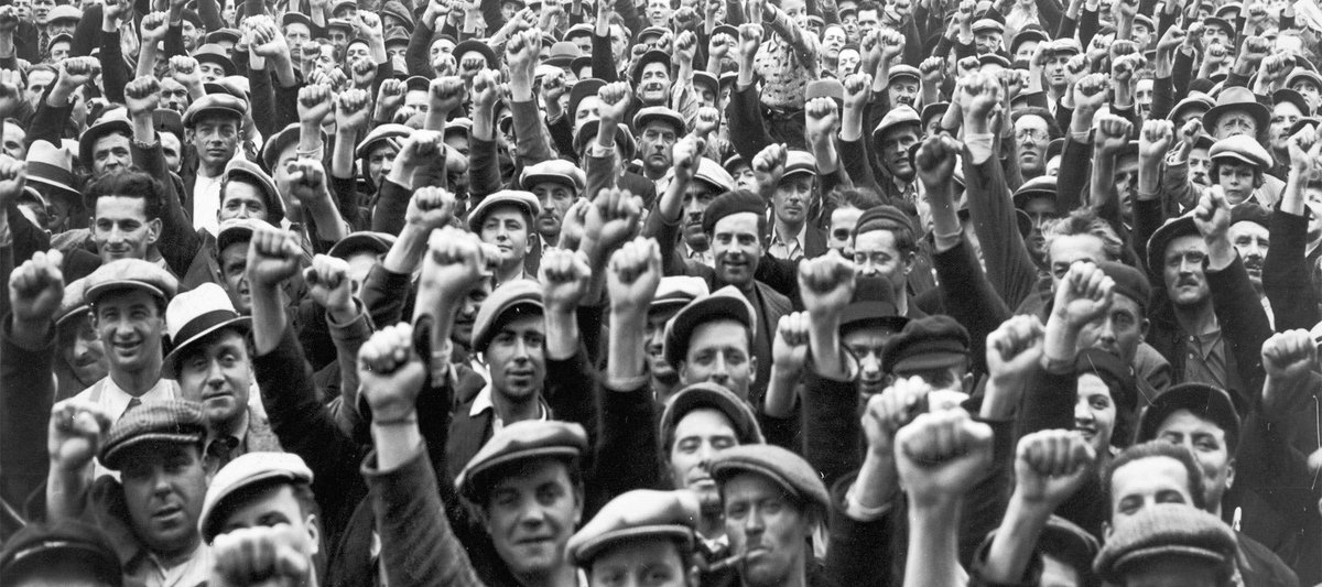 USA 1936: the Social Democratic Federation was founded, by militant radical youth who advocated for “direct action” and open cooperation with the Communist Partythey wore blue shirts and adopted the upraised arm and the clenched fist as a form of salute