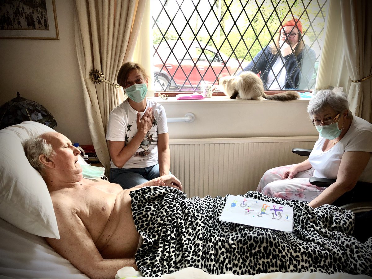 Days after this was taken my lovely dad died My sister’s hand is on her heart as it breaks My nephew Chris is at the window saying goodbyeMy mum’s hand is holding dad under the cover On Dad’s blanket is a beautiful picture drawn by Daisy his granddaughter 