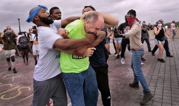 A priest is assaulted while walking down the streets of Washington DC by #ANTIFA terrorists. A Catholic man is beaten while praying the rosary at St. Louis statue in US by #BLM. If @JoeBiden wins US election, many fear these terrorist attacks will increase against Christians.