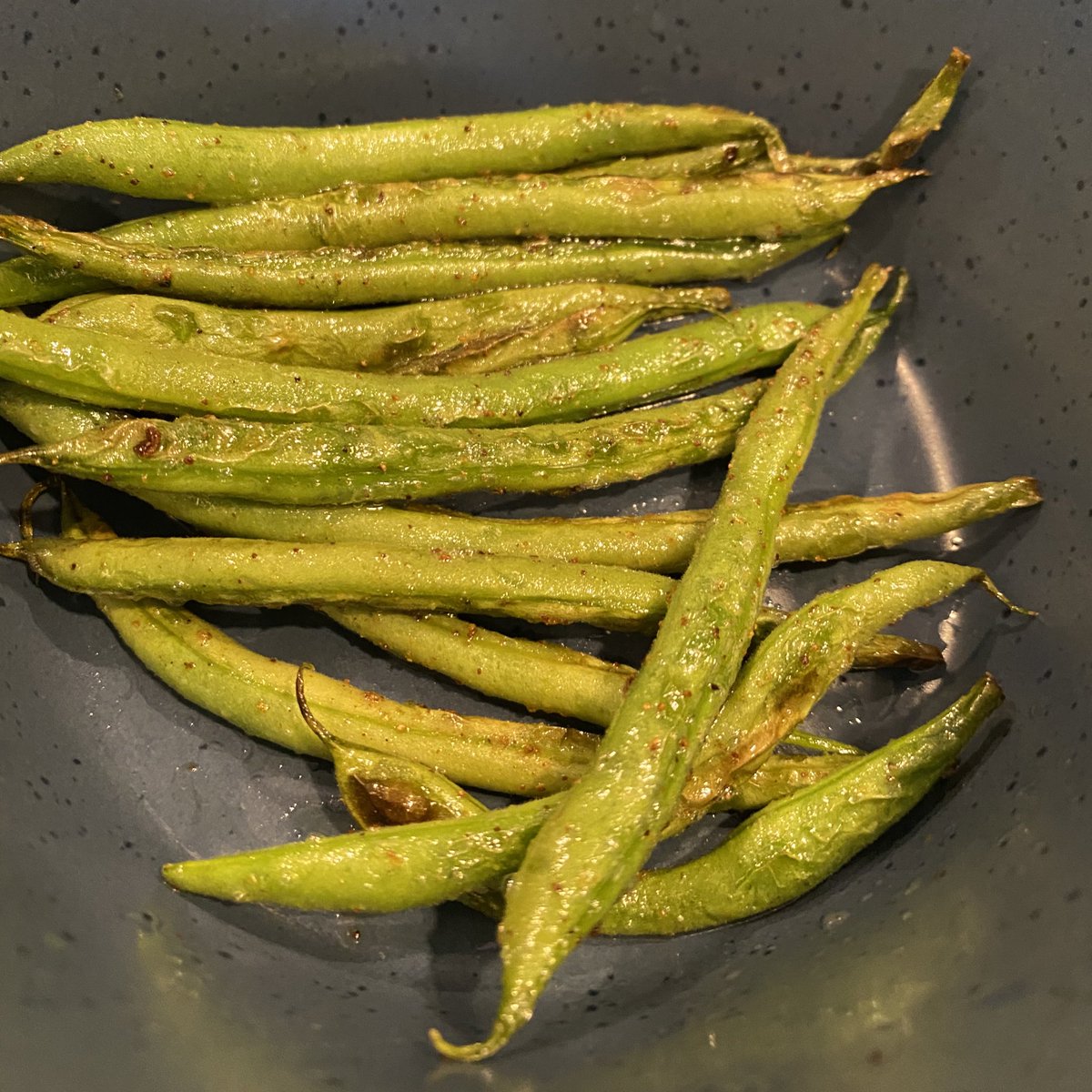 eating my very lil bunch of homegrown string beans, first food from the garden i’ve eaten that ain’t herbs. 