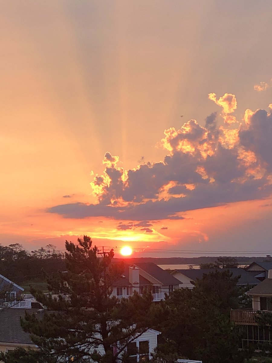 Tom_Gentzel's tweet photo. A metaphor for our time. While at the beach with my family last week, this awesome thunderstorm came through, followed by one of the most incredible sunsets I’ve ever seen. Storms pass, beauty emerges. https://t.co/syjPyuhVzU