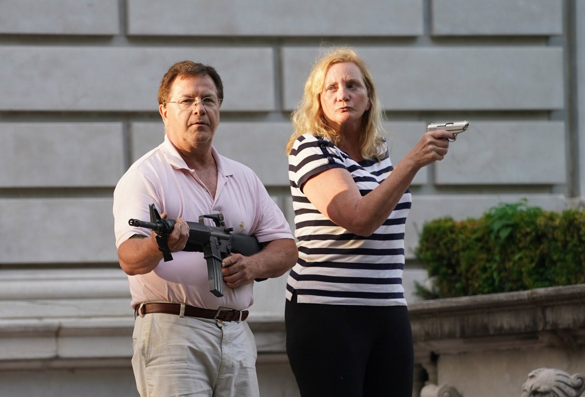 These two drawing guns and yelling at BLM protesters marching past their house deserved a spot. Suggested by  @CultOfSignal and photos by  @BILLGREENBLATT