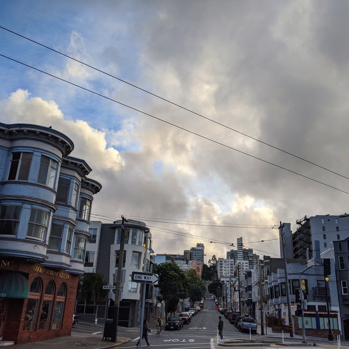 Look at that thin little tower in the background. A giant apartment building on a tiny lot. It is so freaking cool.