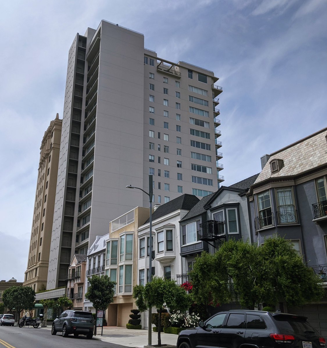 What if they just plopped a twenty story tower next to your building?!?Well, it turns out it's actually totally fine. It does not throw your neighborhood into a never-ending dystopia of hideousness.It is actually just kind of gorgeous.