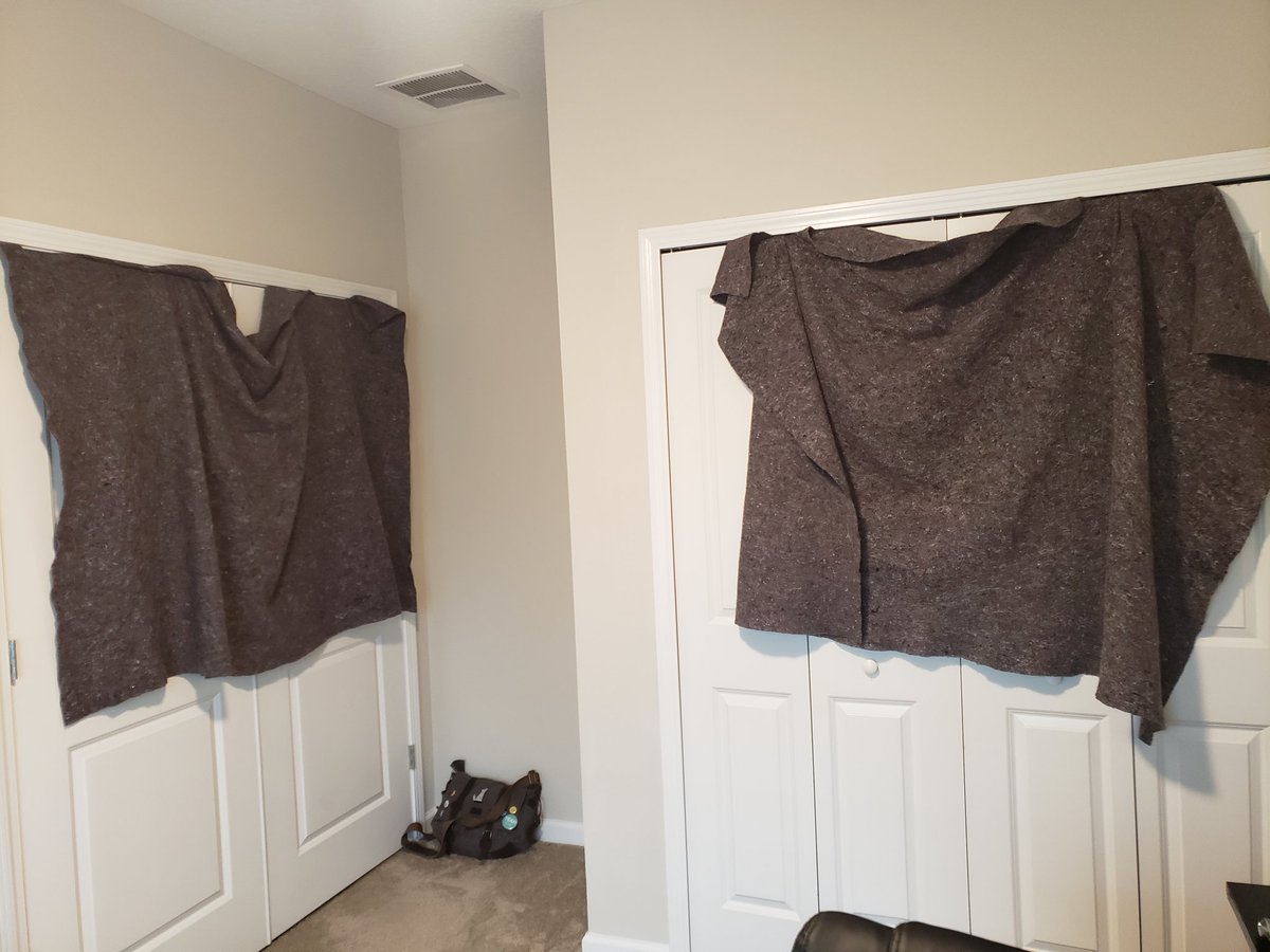 Something a lot of people dont think about before recording is the acoustics of the room they're in. Echo will mess your sound up pretty badly. Here is our super professional and very high-tech echo reduction system. It's 2 moving blankets hung from the doors. And it WORKS.