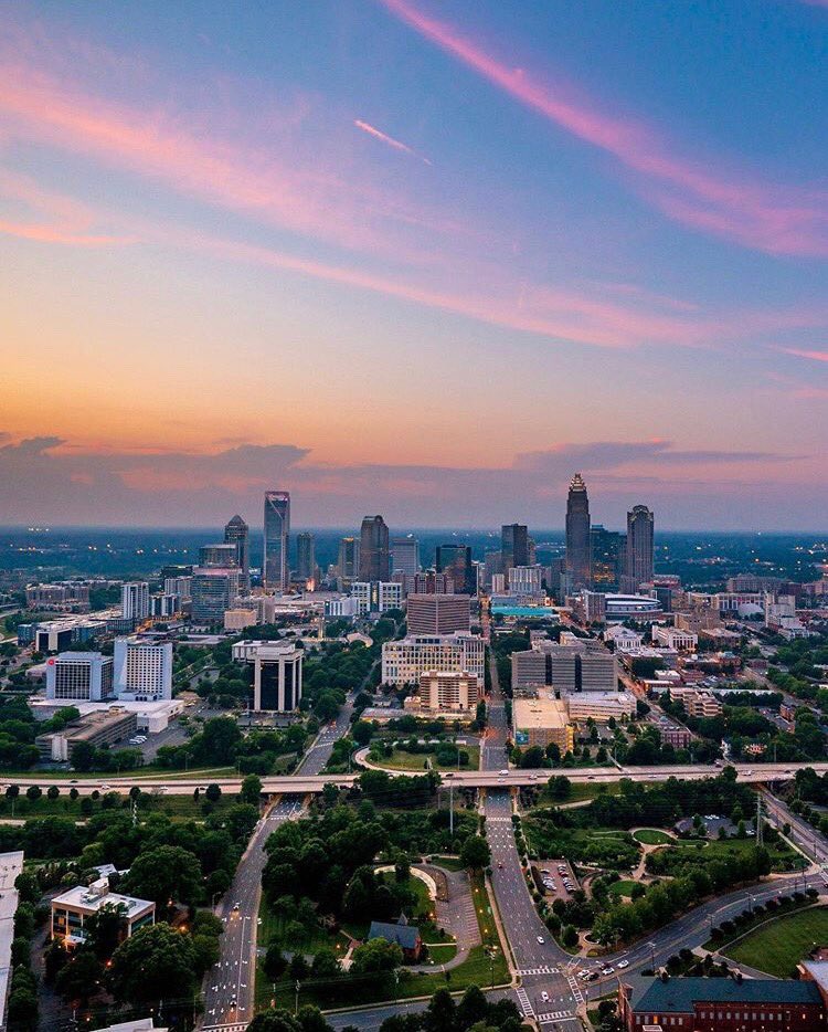 ZoonGarden's tweet photo. We’re in Charlotte! Our big green bus will be driving through the city and our interns will be talking to people on the streets (with masks!) 

PC: @clhughes21 Follow him for beautiful skyline pictures of Charlotte &amp; more! https://t.co/aw5r0nx2k1