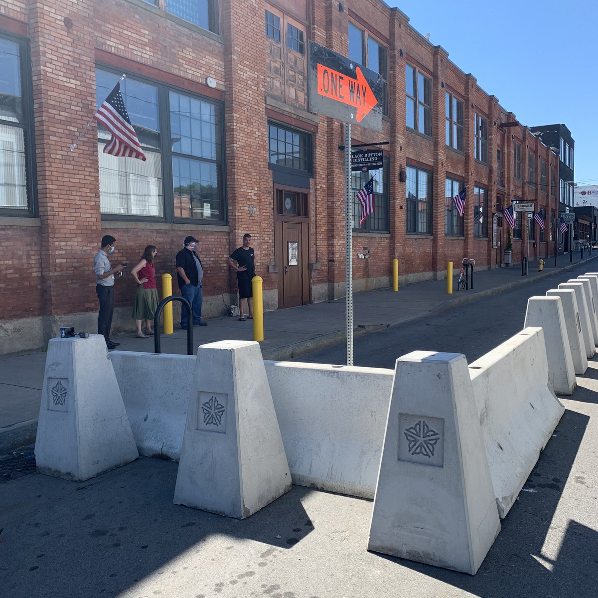ccjgarzone's tweet photo. Out on Railroad Street in #Roc where the city has helped these businesses create an outdoor space for customers... Black Button Distillery says about 150-180 people can be served out here at these five locations. They say this move is critical to stay afloat https://t.co/s70bdBRAR2
